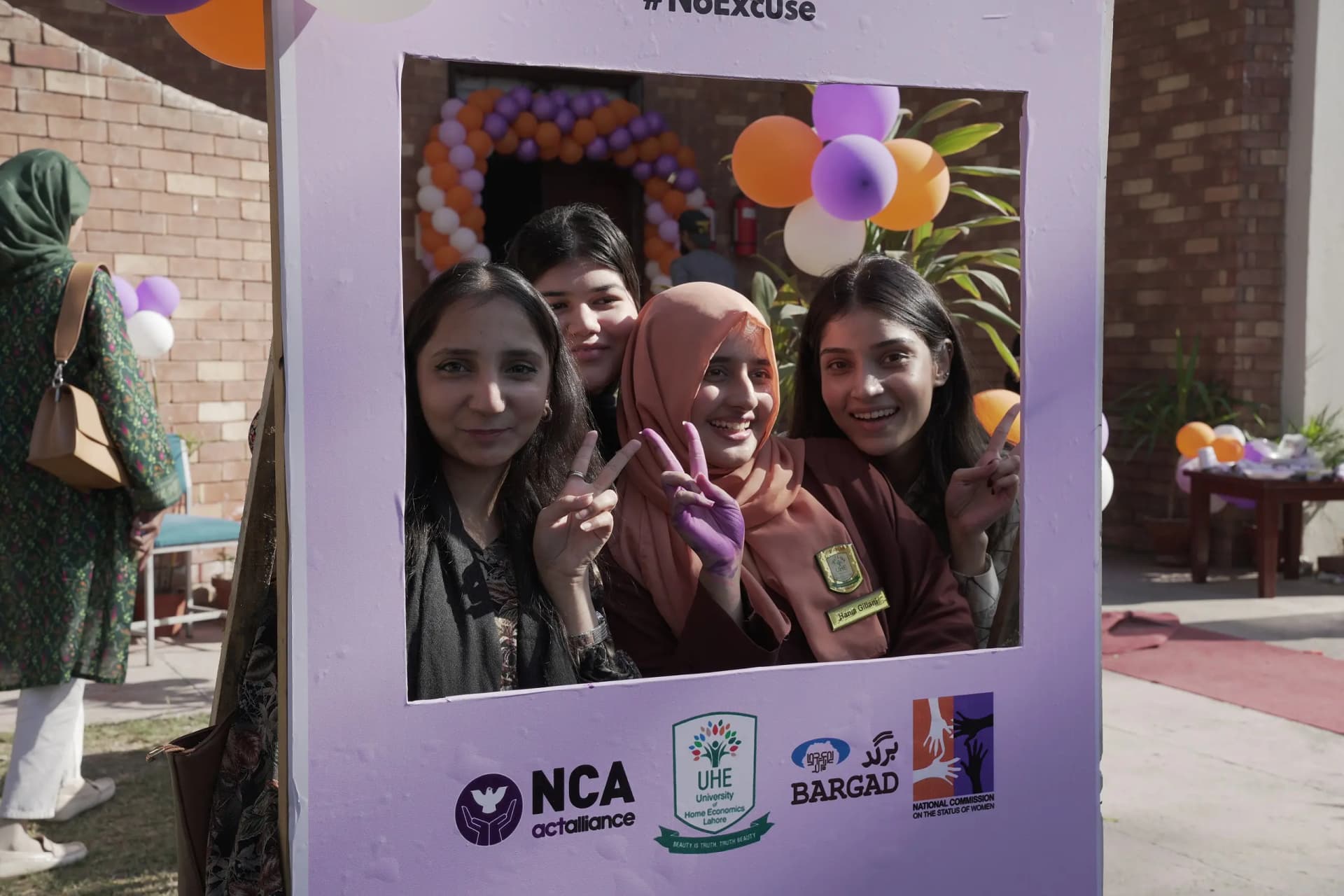 Bargad volunteers posing in a photo frame