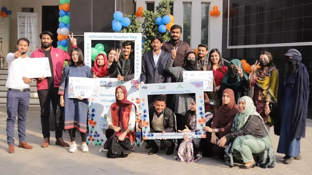 Bargad participants at a youth event with photo frames